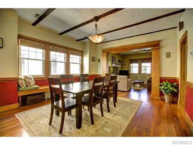 Large Dining Room with exposed beams, huge 10' win