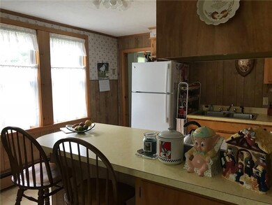 Kitchen view opening leads to...