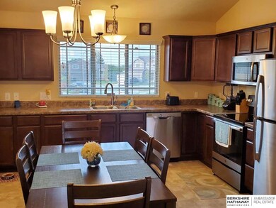 Stainless steel appliances, lots of counter space, large window looks out the front of the home.