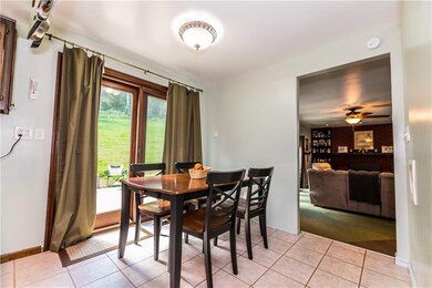 Eat in Kitchen area with double doors to back yard