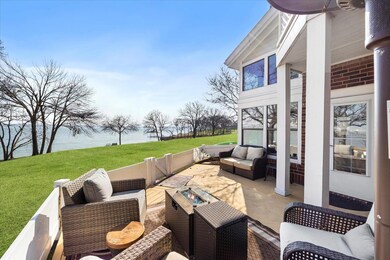 View of patio / terrace featuring a water view and