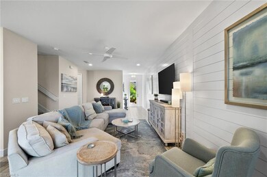 Living room with dark hardwood / wood-style floors