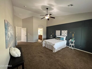 Master bedroom with custom wall
