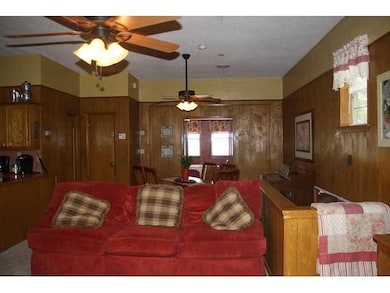 Living Room. A view back into the sun porch