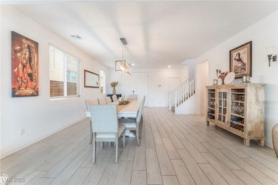 Dining room featuring light wood finished floors,