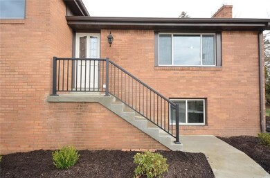 New concrete walkway leading up to the front door 