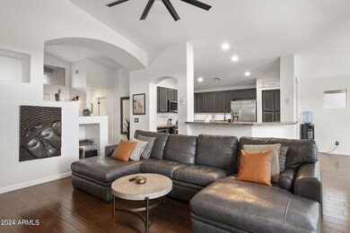 Great room opens to kitchen and dining