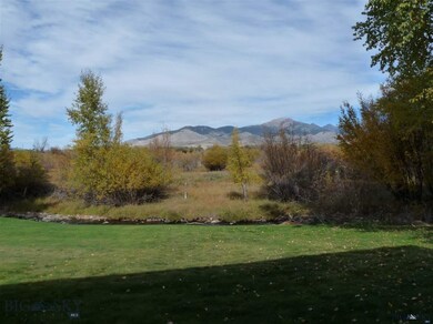 View across creek to neighboring ranch