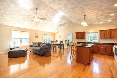 Open concept, hard woods throughout and lots of li