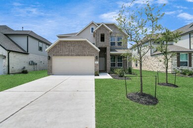 The residence features a practical 2-car garage co