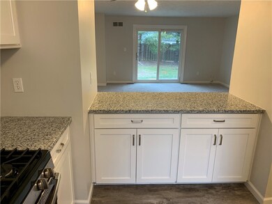 Convenient bar counter in kitchen leading to dinin