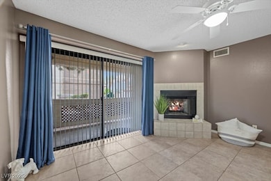 Cozy living area with fireplace and direct access