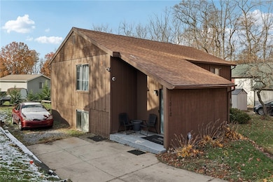 View of home's exterior featuring a shingled roof