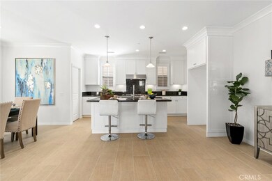 Upgraded kitchen with stainless steel KitchenAid appliances.