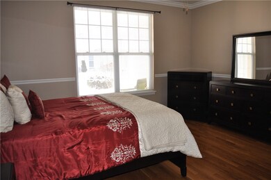 Master Bedroom w/ Hardwood Floors, Crown Moldings,