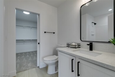 Primary bath with large walk-in closet