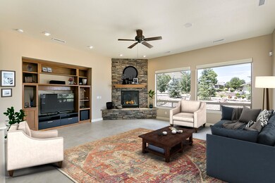 Great room with gas fireplace and view