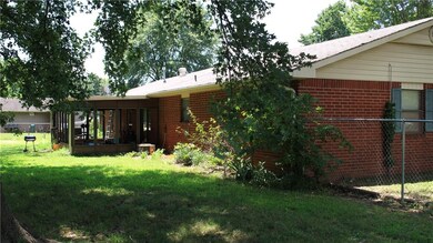 View from the side of house in the backyard