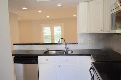 Granite counter tops overlooking the Living area