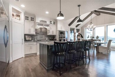 Kitchen Features Hardwood Floors, Walk In Pantry, 