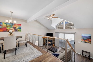 Living room with ceiling fan with chandelier,  har