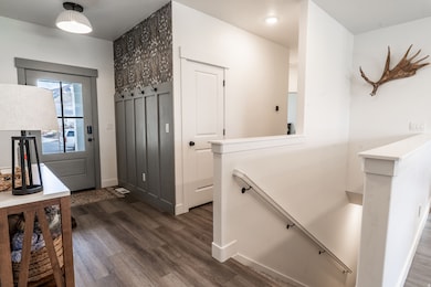 Great windowed front door with cute entry