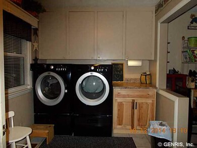 Laundry Spacious laundry room with adjoining stora