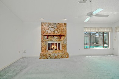 Family Room-Fireplace and Pool View