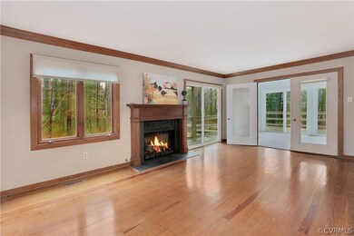 Family Room with a second fireplace. This is a pro