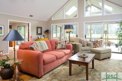 Light, bright living room offers smooth cathedral 