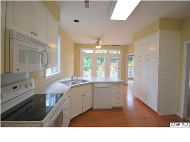 Spacious kitchen opens up to rear patio
