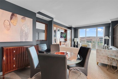 Dining room with tile patterned floors and crown m