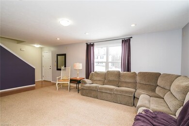 Open floor plan includes a large, light-filled liv