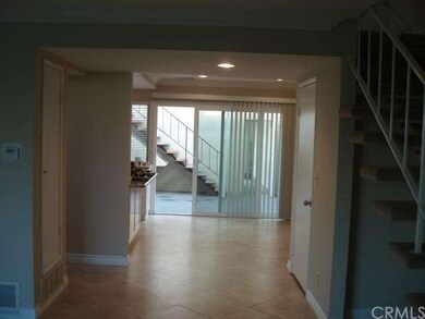 View of hallway and back Patio from Living Room