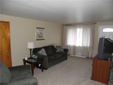 Living Room. Spacious Living Room w/ Newer Carpeti