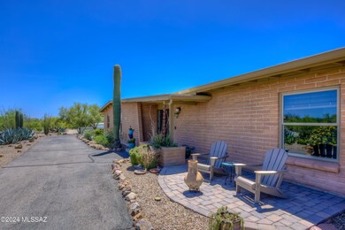 Paved Driveway & Front Brick Patio
