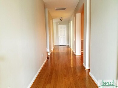 Gorgeous hardwood floors! Freshly painted with She