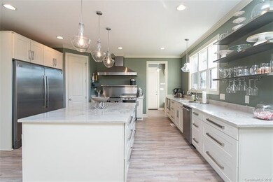 Gorgeous gourmet kitchen with professional applian