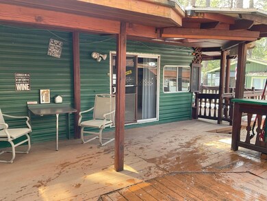 5 Lots of usable deck + overhang at entr