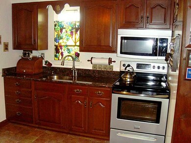 Kitchen. Cherry cabinets and granite countertops