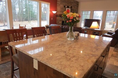 Granite, storage below, seating for 2 or 3