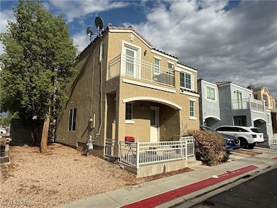 View of front facade with a balcony, a porch, stuc