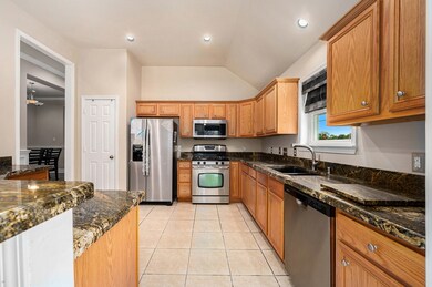 Another view of this awesome kitchen. Fridge Stays