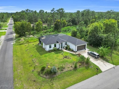 4006 E 2nd St, Lehigh Acres, FL 33936 - photo 2