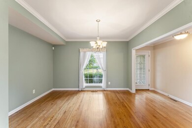 Formal dining room and front door view. Wood floors are in GREAT shape!