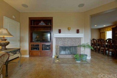 Family Room with Custom Tile Inlays in Flooring & 