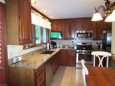 Kitchen with stainless steel appliances and granit