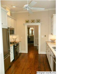 Kitchen flows out to backyard with only two steps 
