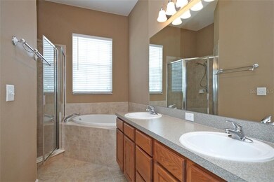 Master bath with garden tub and separate shower; d