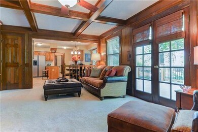 Family room opens to the eat-in kitchen; French do
